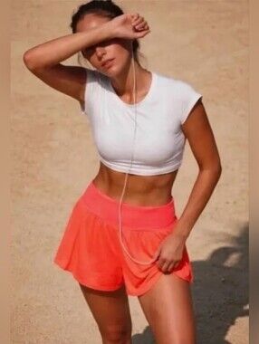 FP MOVEMENT NEW NWOT Light As Air Running Shorts UV Protection Coral Orange XS